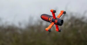 Read more about the article Watch: World’s fastest camera drone races F1 champ Max Verstappen